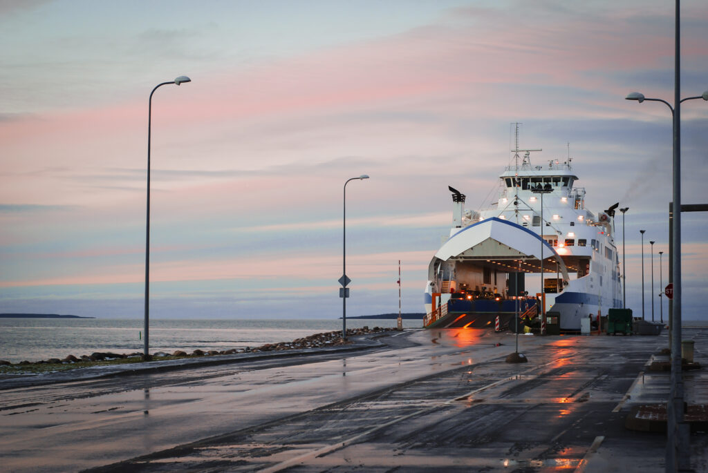 ferry at dock with colorful sunset sky reflecting 2025 01 10 04 59 20 utc Clayton Industries – Advanced Steam Boiler Technology